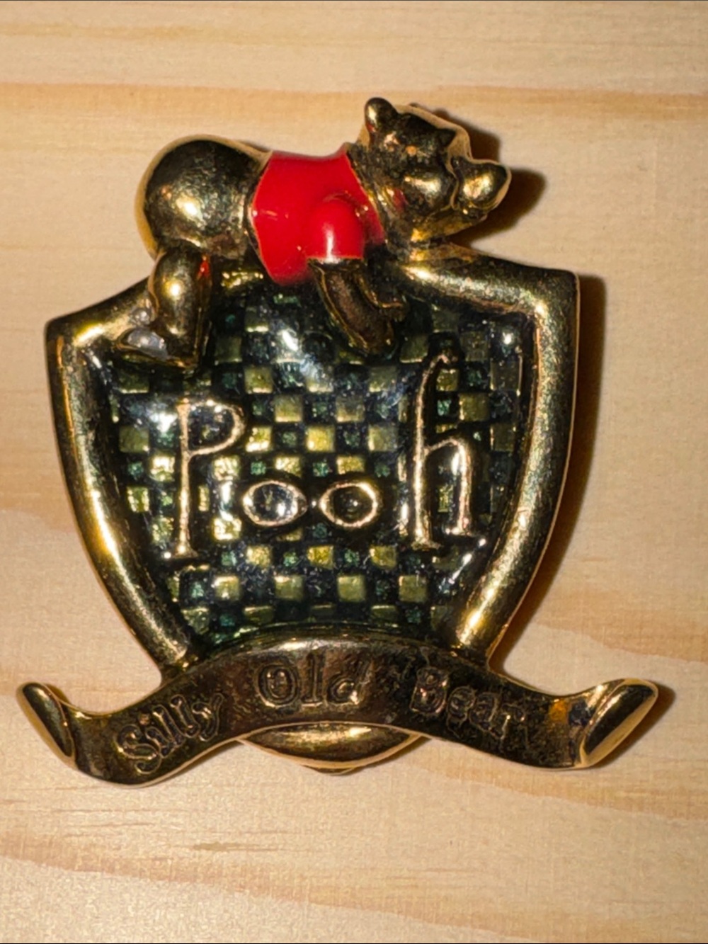 Disney “Silly Old Bear” Pooh Shield Enamel Pin in Gold with Red Accent